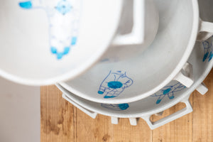 colander with blue handpainting